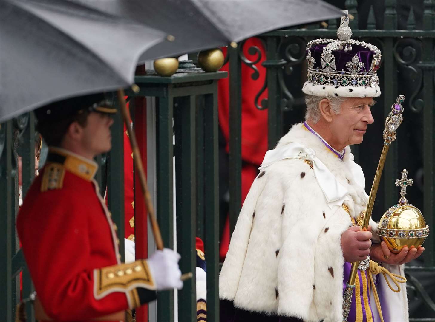 The King leaves Westminster Abbey after his coronation ceremony (Joe Giddens/PA)