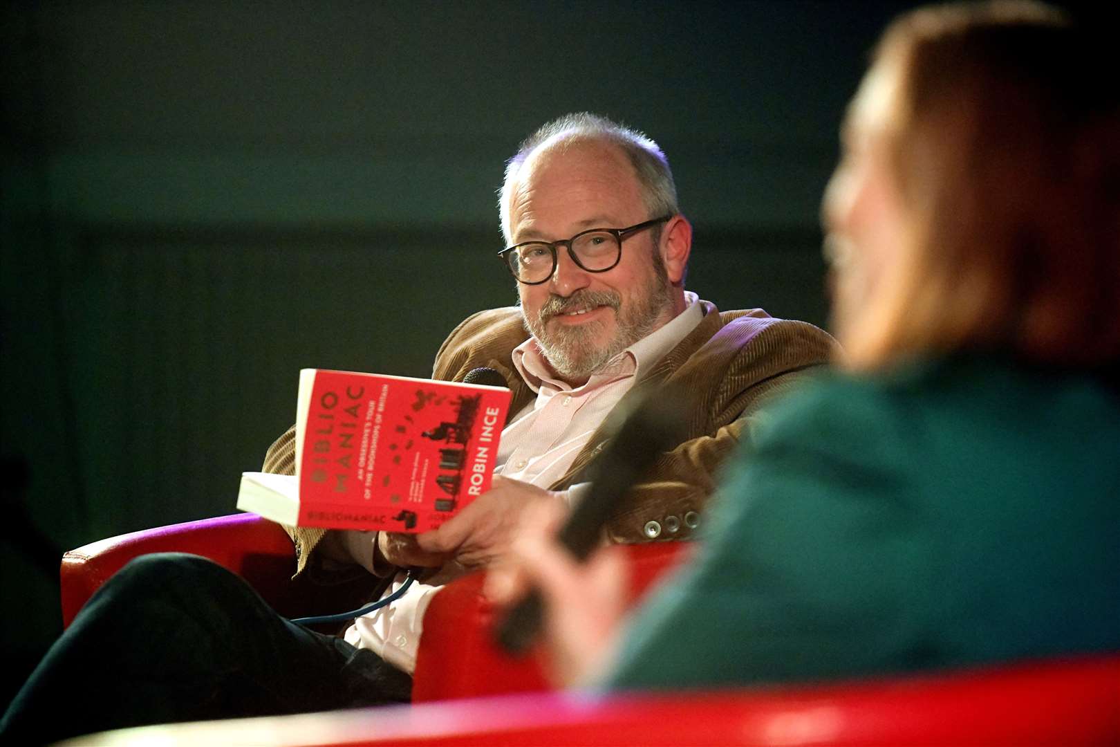 A first for Robin Ince, reading from his own book at Saturday night's NBF event. Picture James Mackenzie