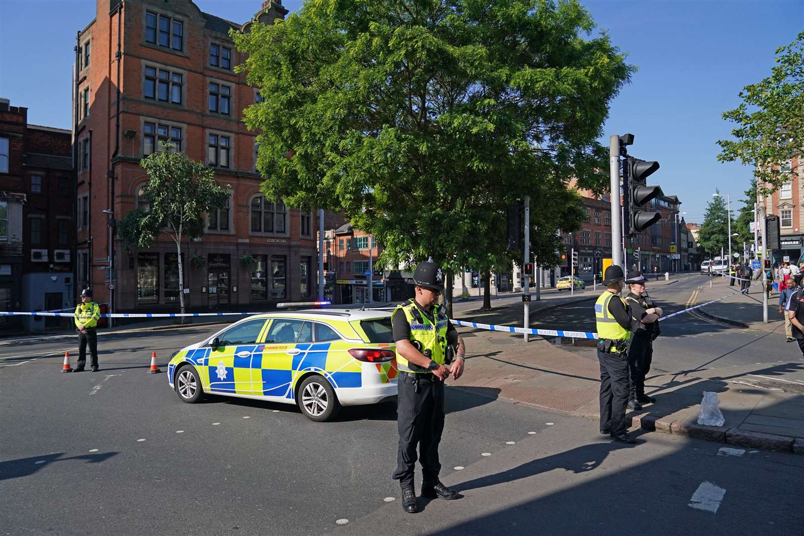 Police at the Maid Marian Way junction of Upper Parliament Street in Nottingham (Jacob King/PA)