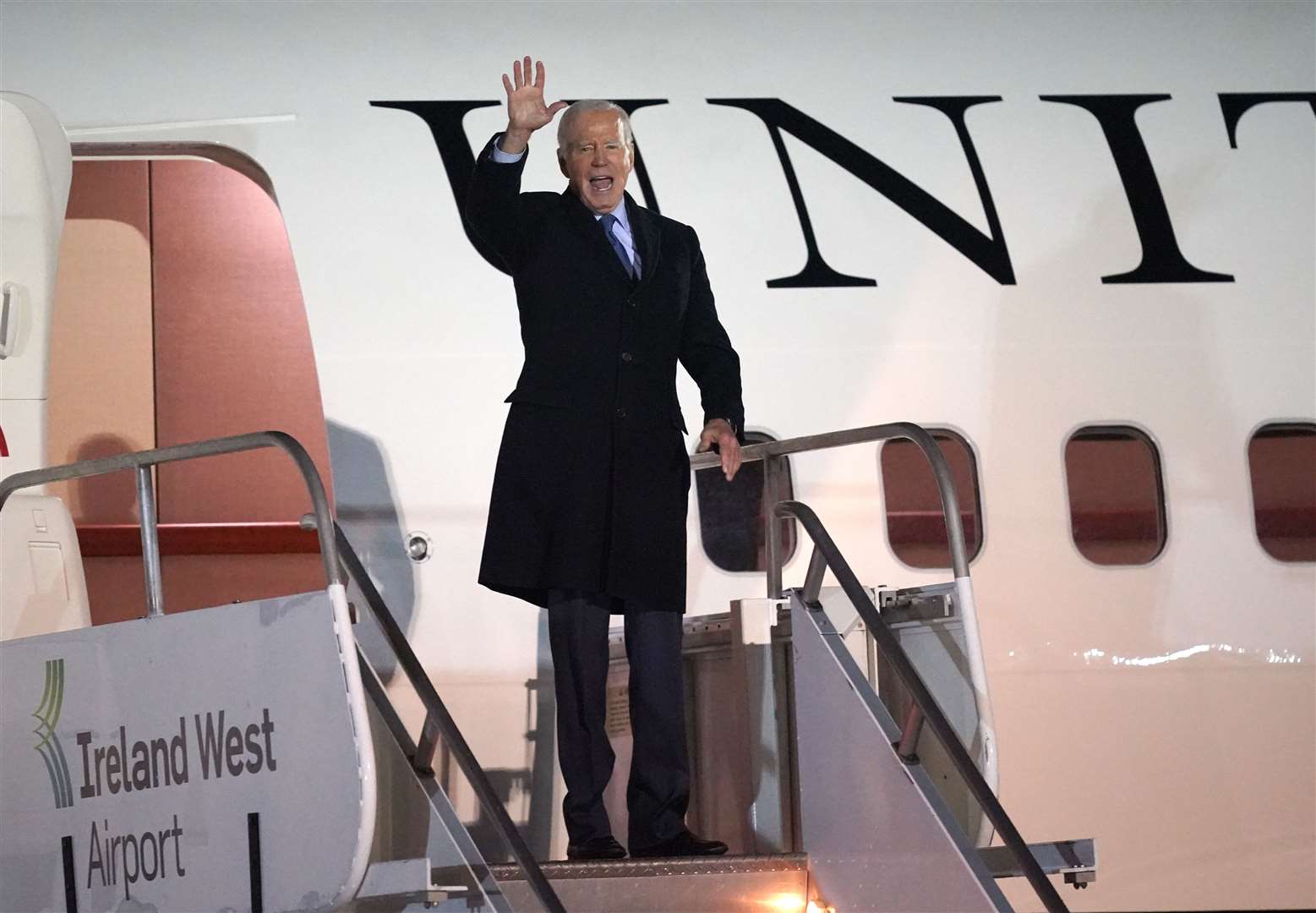 US President Joe Biden boards a plane to leave Ireland West Airport Knock, in County Mayo, on the last day of his visit to the island of Ireland (Niall Carson/PA)