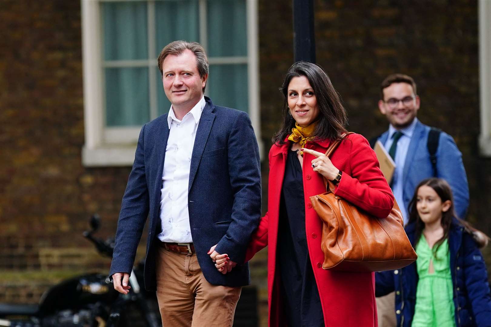 Nazanin Zaghari-Ratcliffe with her husband Richard Ratcliffe and daughter Gabriella arriving in Downing Street (Victoria Jones/PA)