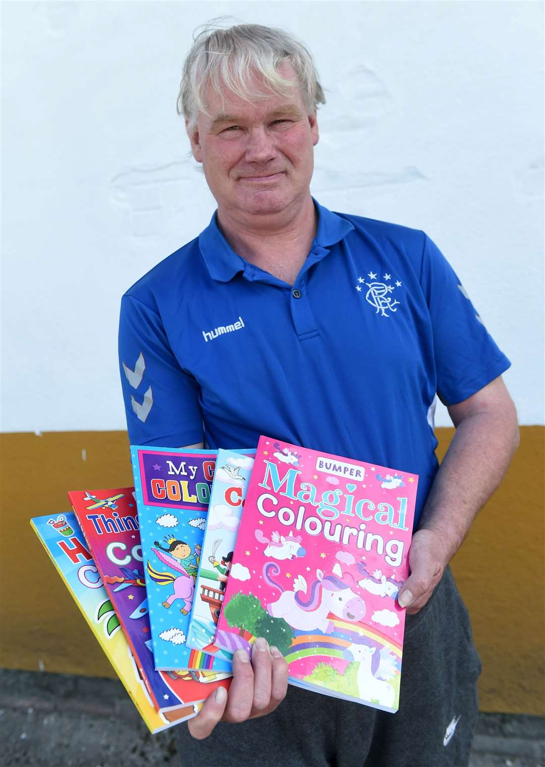 Martin Macdougall gave away free colouring books to help out parents struggling to keep kids busy.