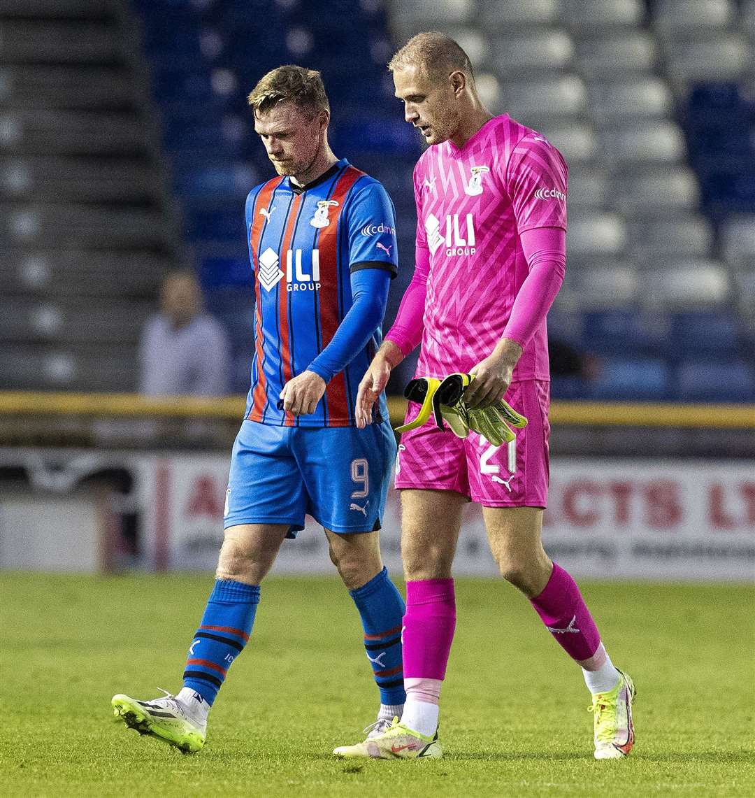 ICT’s Billy McKay and keeper Cammy MacKay walk off disappointed after the League Cup group defeat to Airdrie.