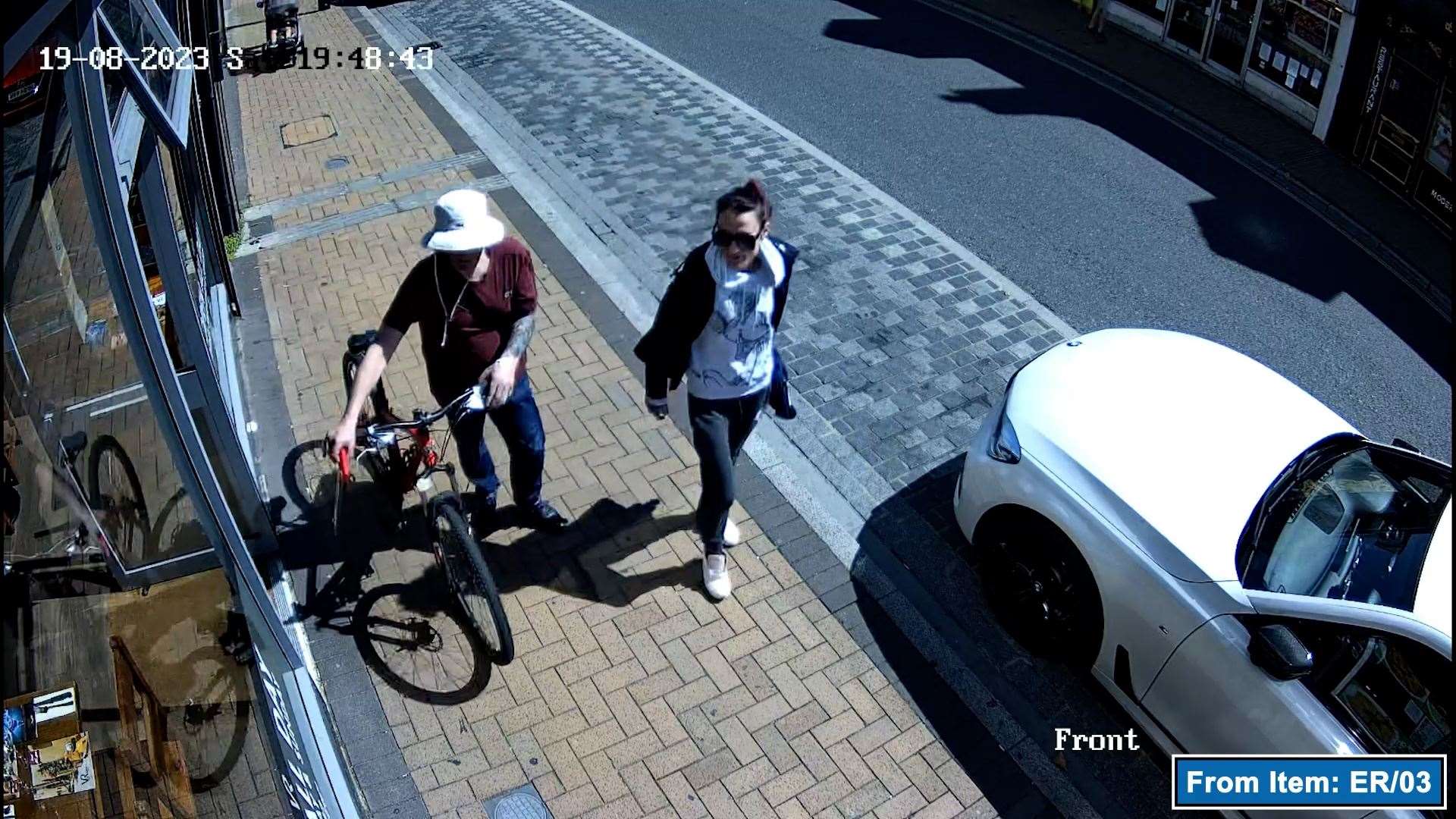 CCTV showing Benjamin Atkins and Debbie Pereira walking with a hacksaw (Crown Prosecution Service/PA)