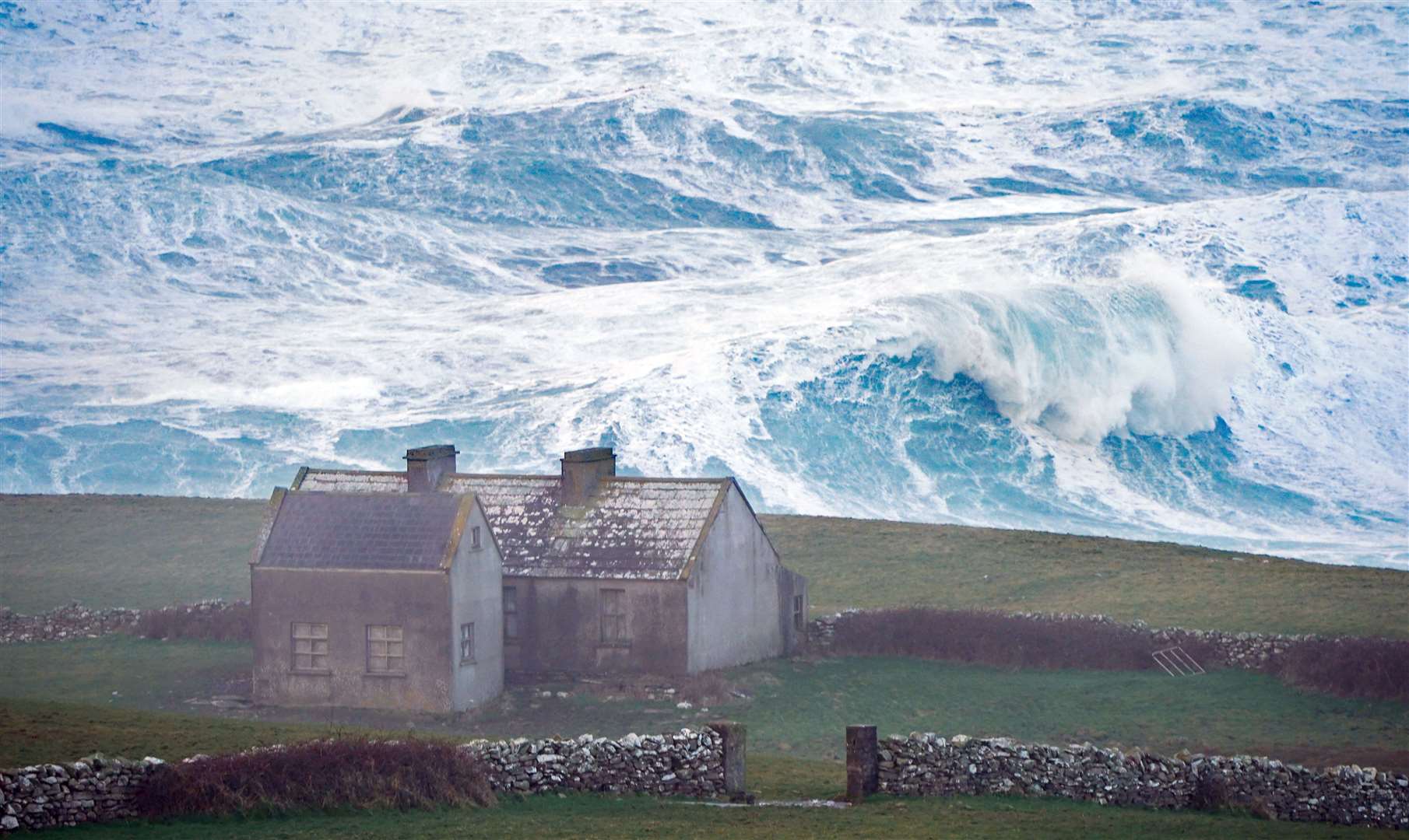 High waves in Doolin in County Clare on the west coast of Ireland (Niall Carson/PA)