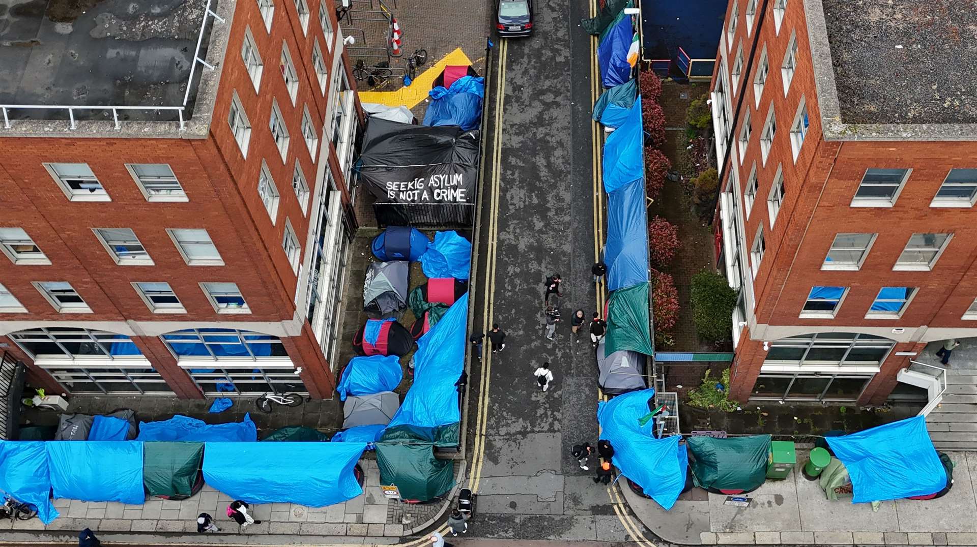 Tents housed asylum seekers near to the Office of International Protection in Dublin (Niall Carson/PA)