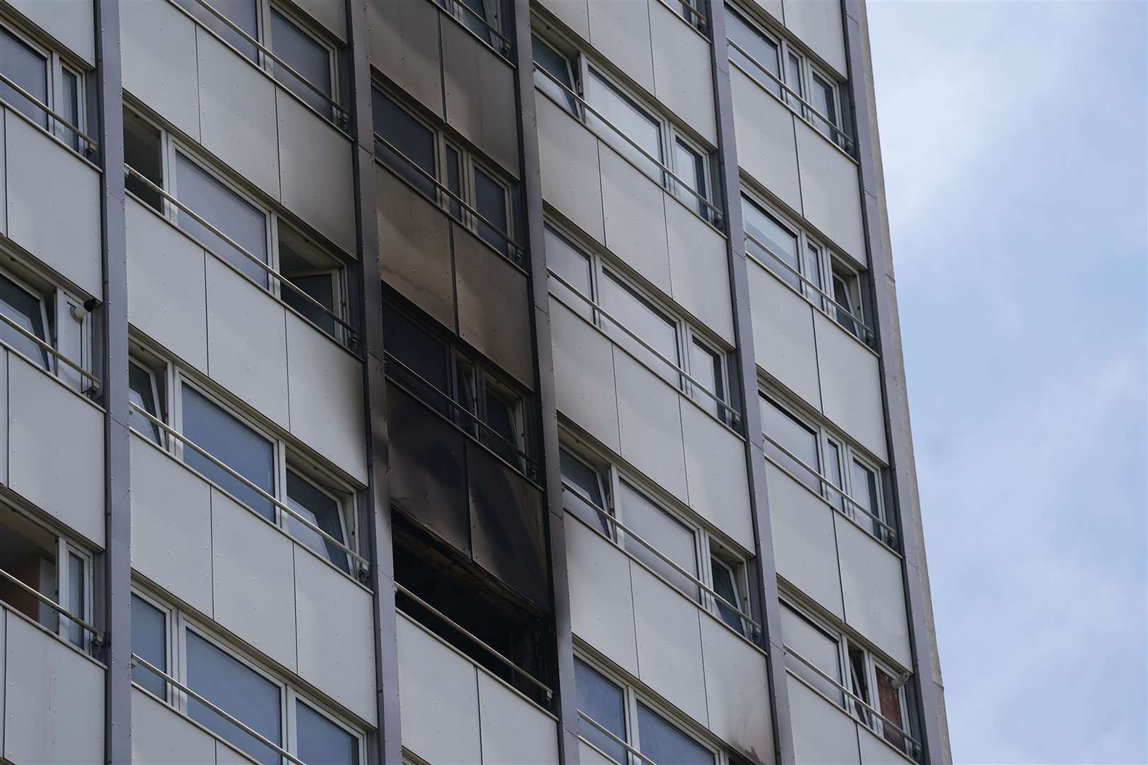 Scorch marks can be seen outside the flat after the blaze (PA)