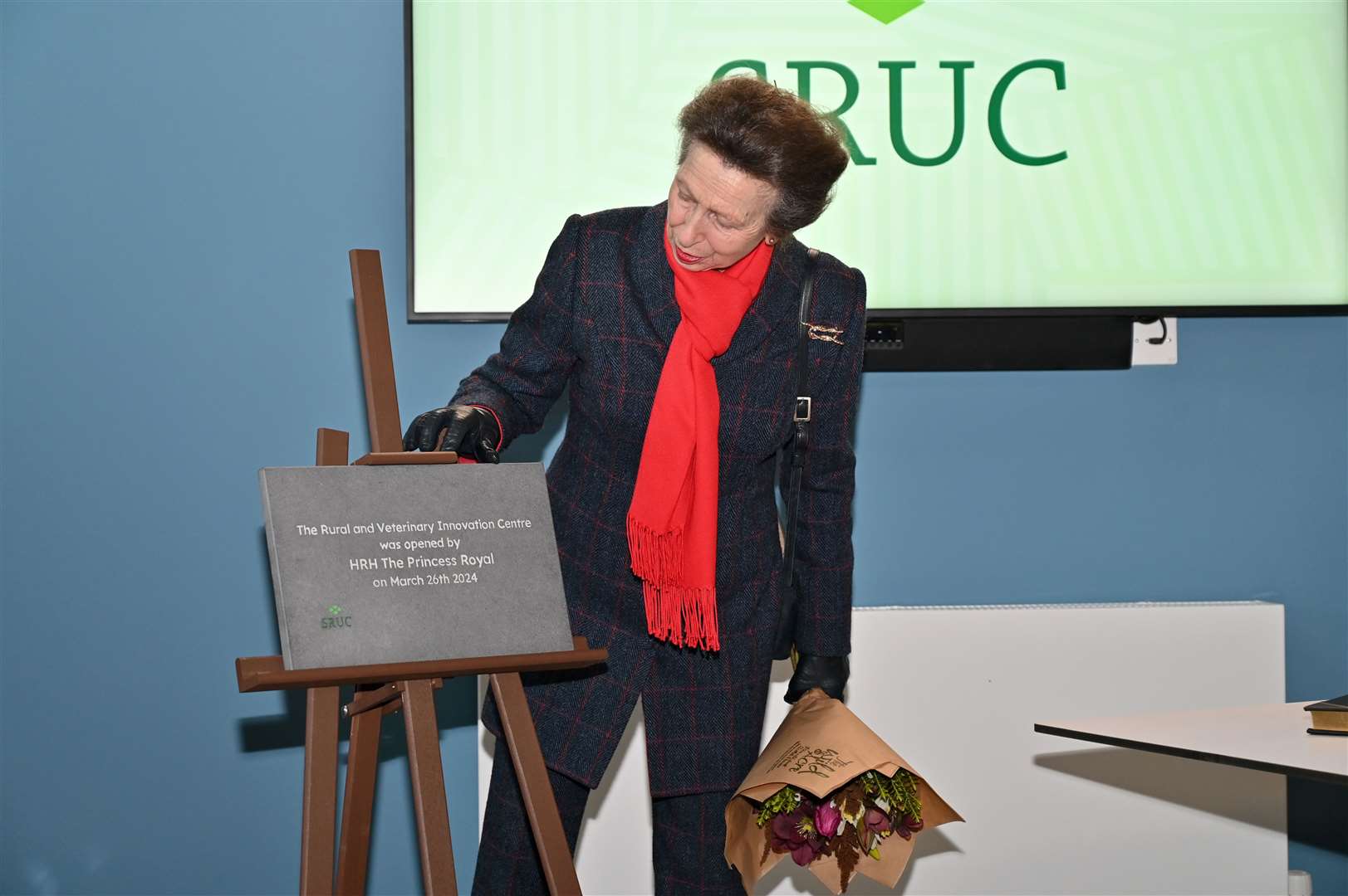 Princess Anne presenting a plaque at the opening of the Rural and Veterinary Innovation Centre in Inverness.