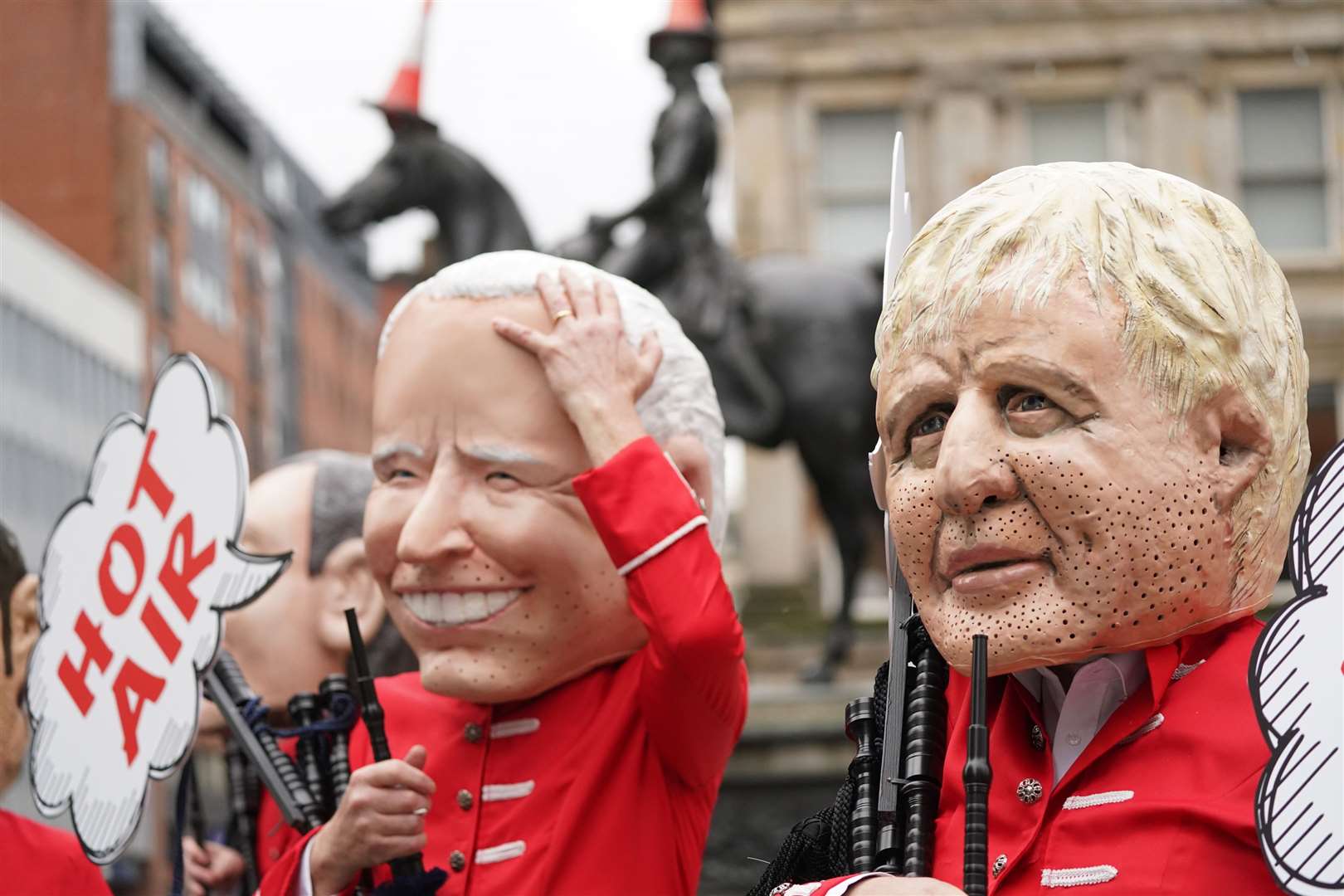 Oxfam’s big heads, including Joe Biden and Boris Johnson, are demanding that the Cop26 summit produces more than just ‘hot air’ (Owen Humphreys/PA)