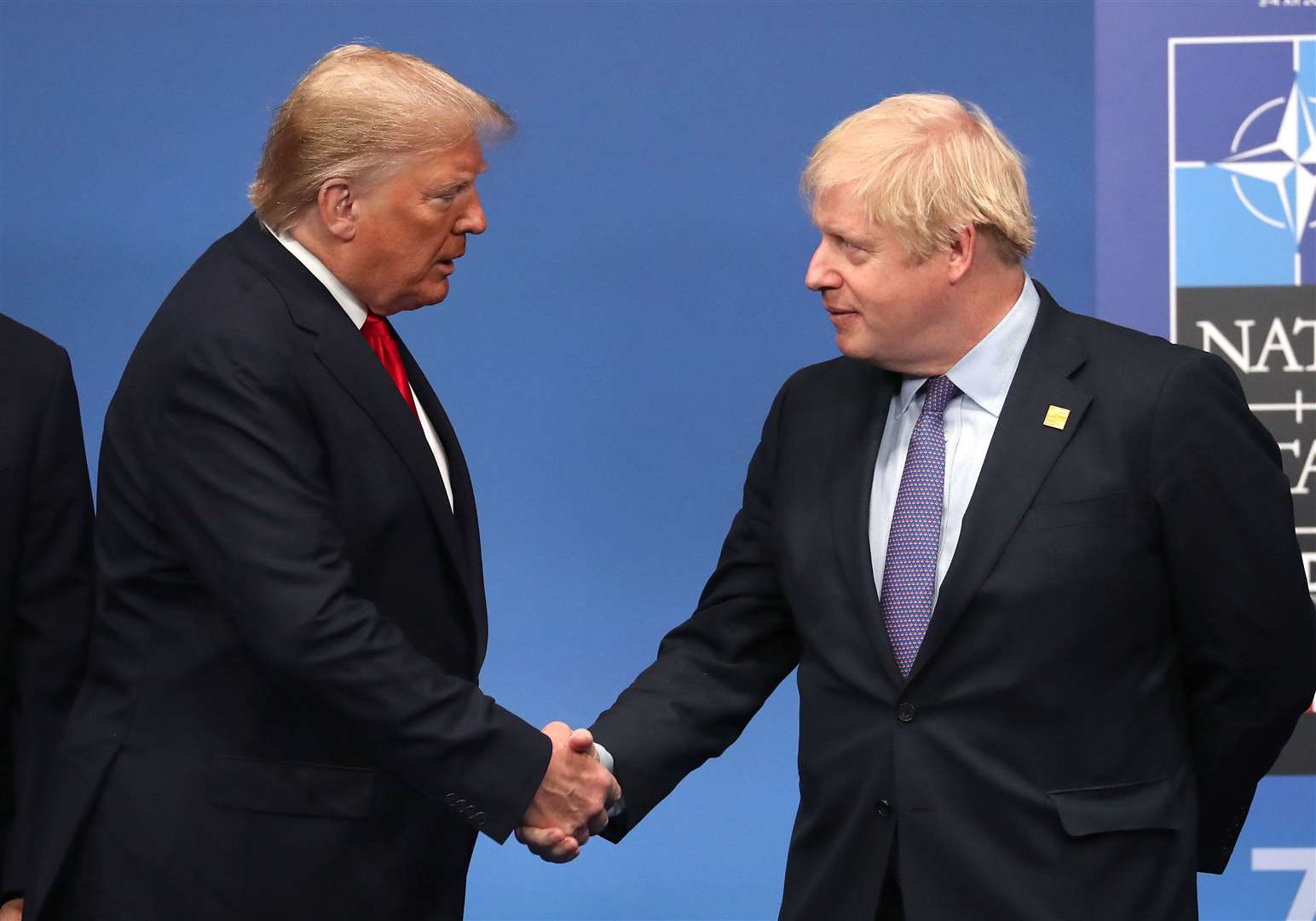 Donald Trump with Boris Johnson (Steve Parsons/PA)