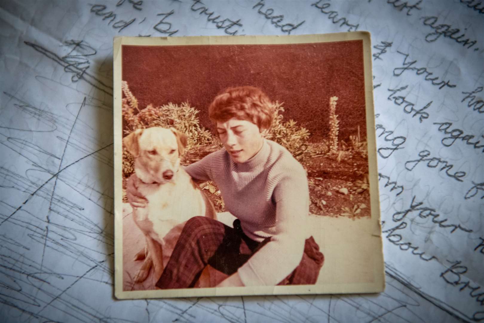 Edna Clyne-Rekhy aged 17 with her first dog, Major, whose death inspired The Rainbow Bridge. Picture: Callum Mackay.