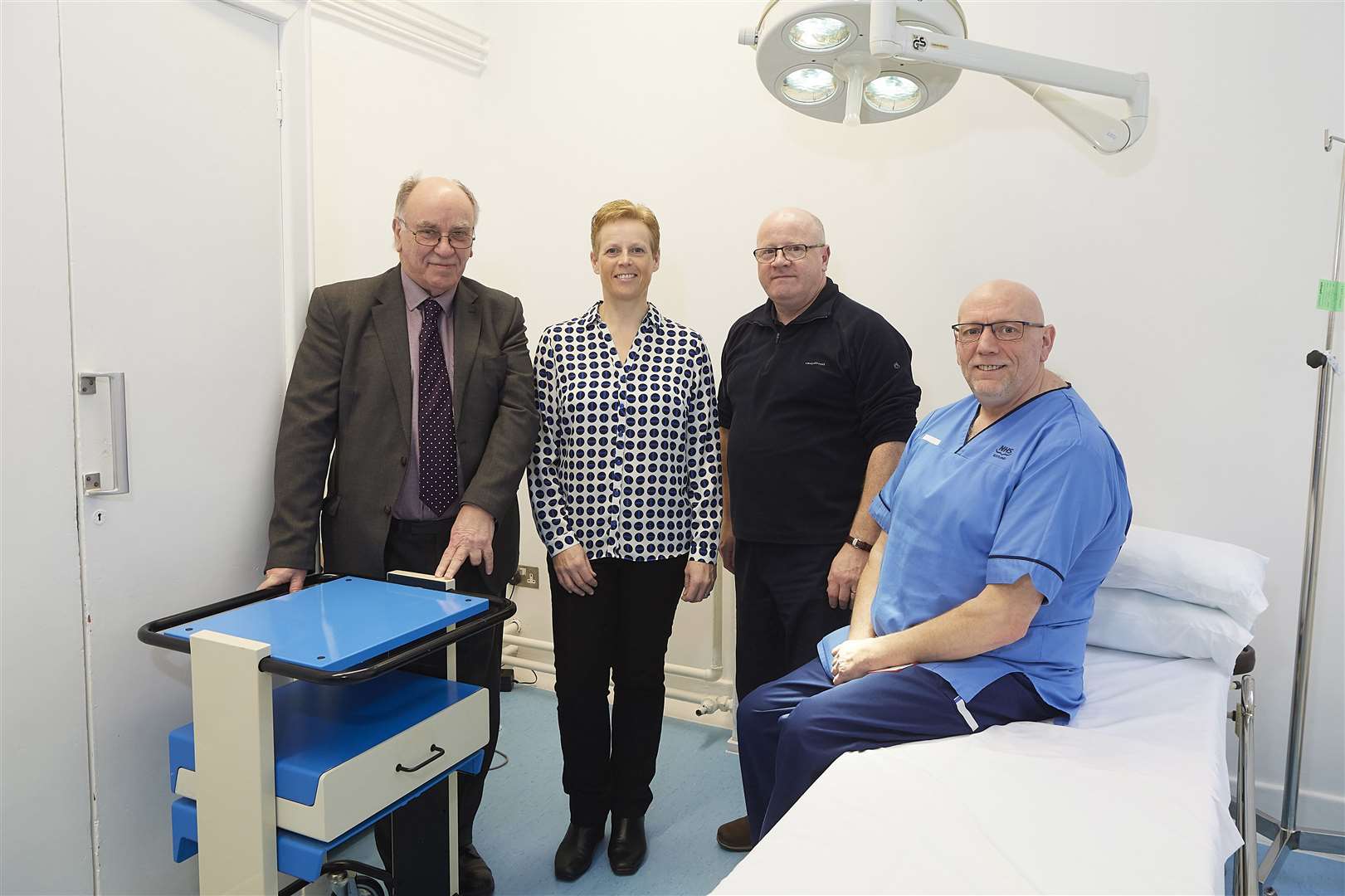 Businessman David Sutherland (left) with Jackie Milburn, Dr John Macleod and specialist nurse Anthony Lester at the Golspie treatment clinic.