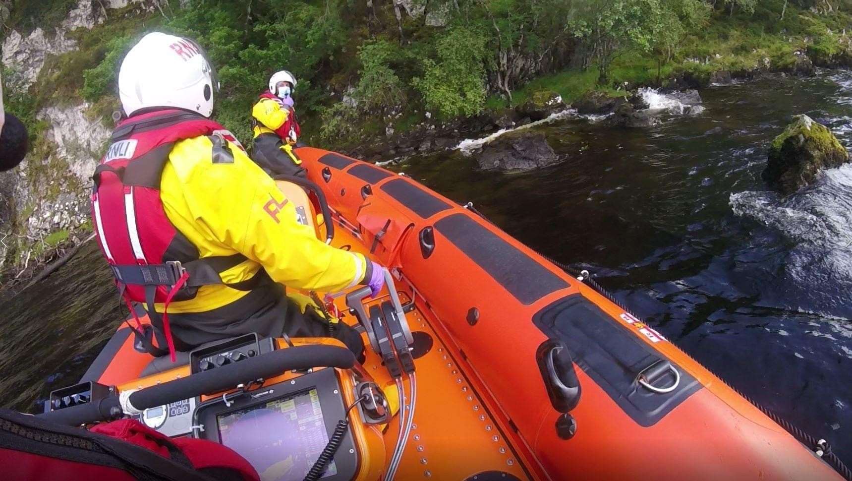 The Loch Ness RNLI crew go to the rescue one of the boys.