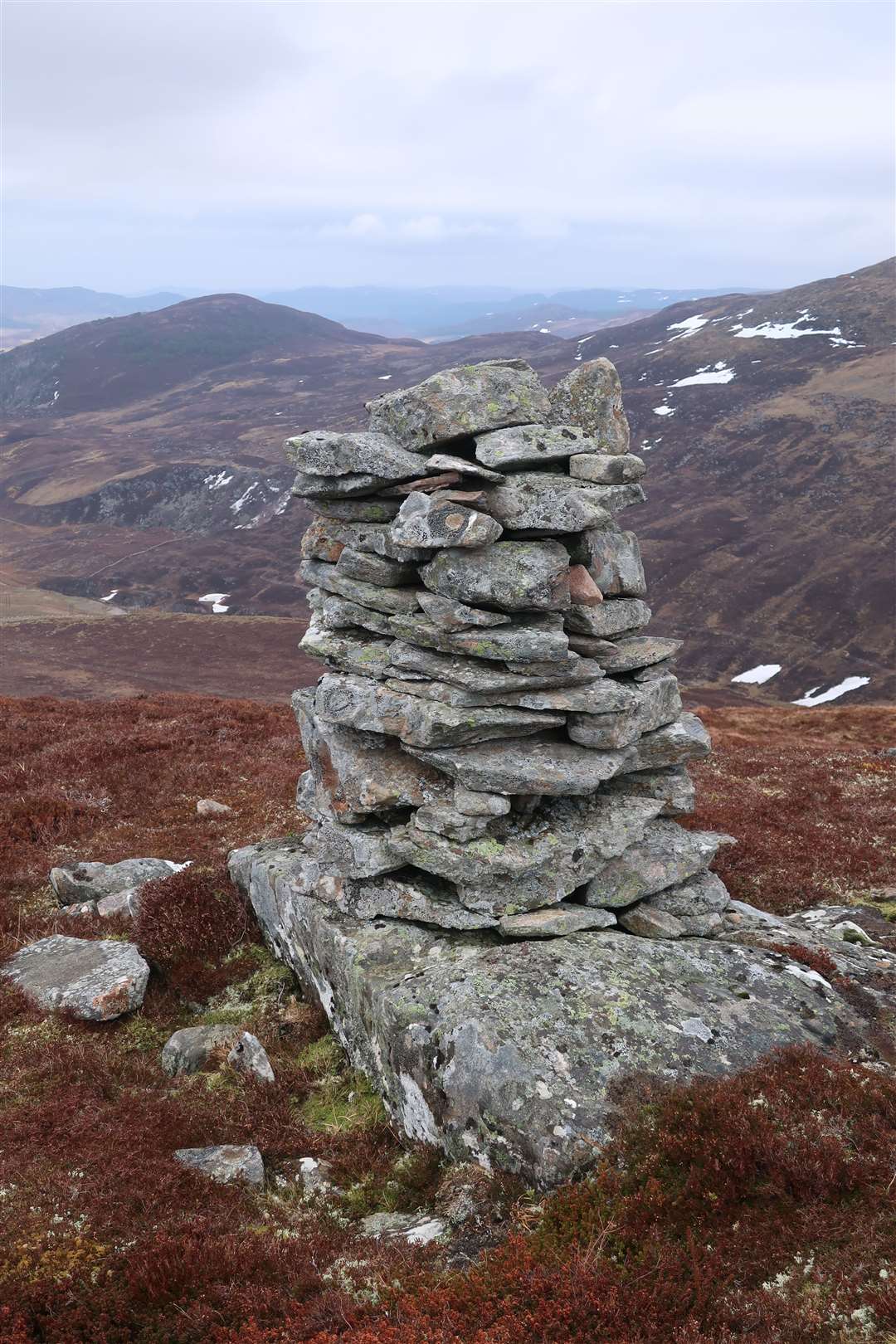 Beinn Mheadhoin has a substantial cairn just north of its summit, which is marked on the OS map.