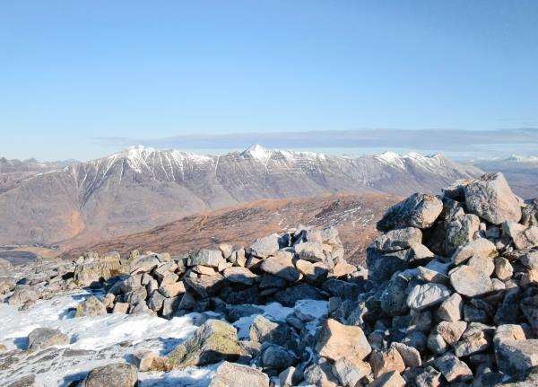 Beinn Damh’s summit cairn with Maol Chean-dearg in the foreground.