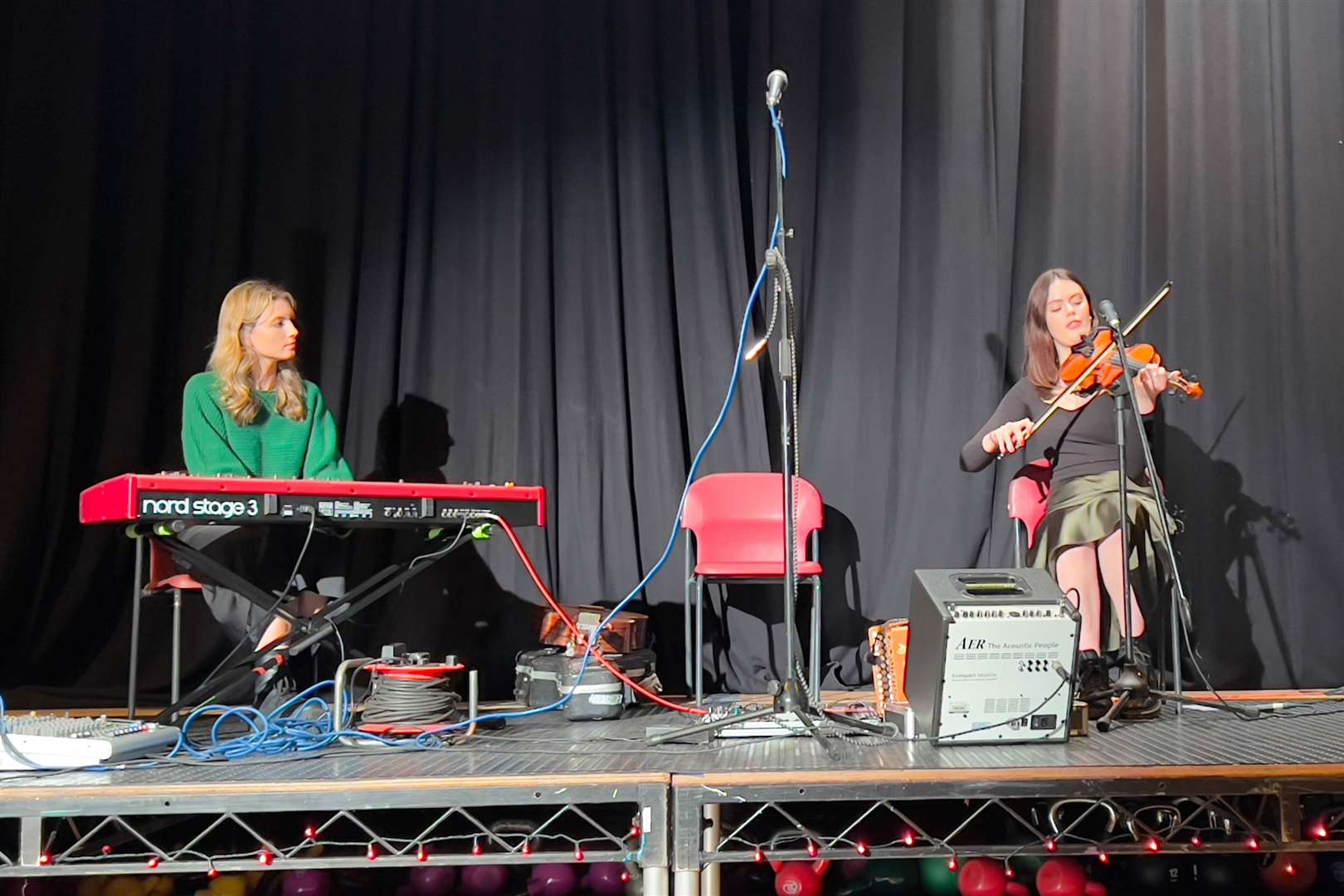 Kentra featuring Kate Macleod on fiddle and Amy Naulls on piano in performance at the Black Isle venue.