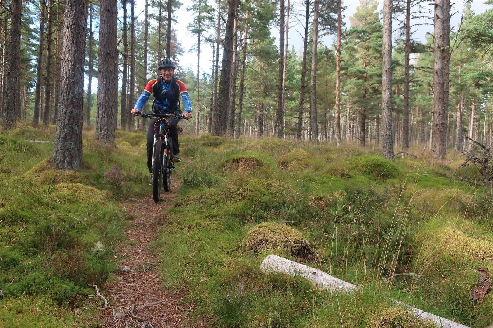 John enjoying the beautiful singletrack which was an unexpected find on this route.