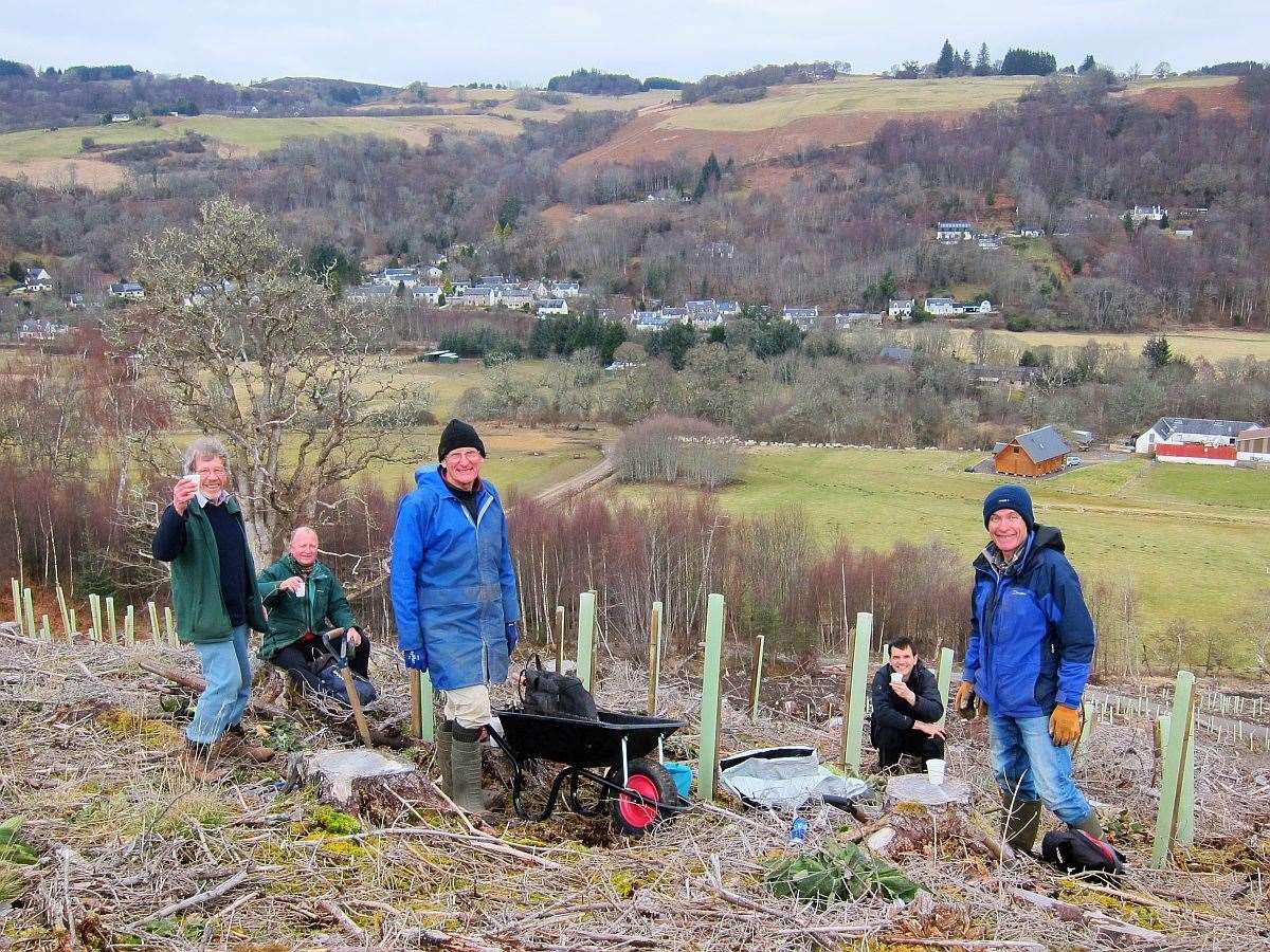 CWA members (from left) Neil MacInnes, Bill Smart, Peter Wilkes, Gordon Watson and Neil Barron working in the newly planted woodland.