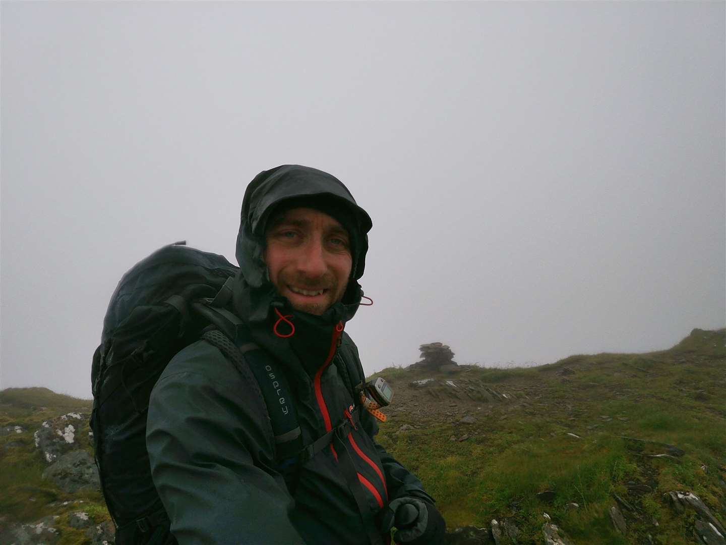 John at the summit of Sgurr Choinnich after the windy ascent of the west ridge.