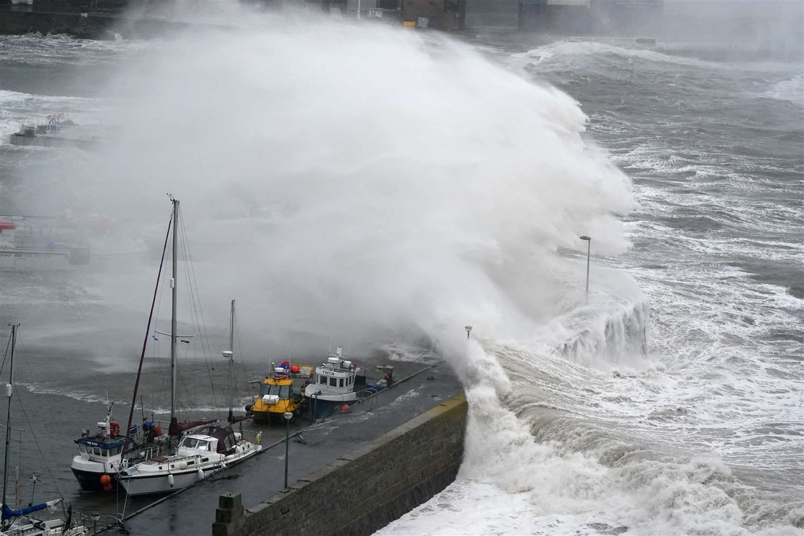 Waves at Stonehaven Harbour during Storm Babet (Andrew Milligan/PA)