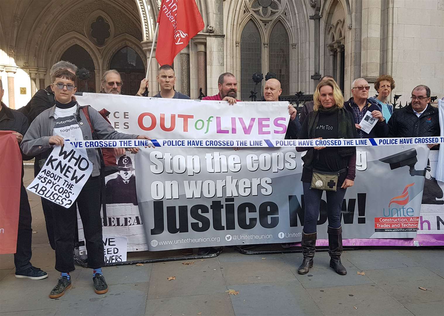 Campaigners outside the Royal Courts of Justice (Tess De La Mare/PA)