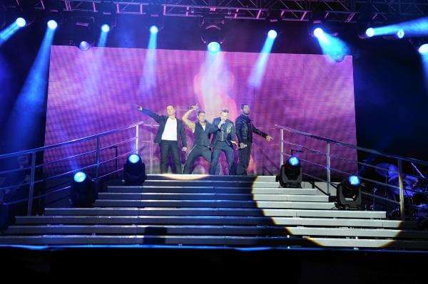 Boyzone arrive onstage at the Northern Meeting Park.