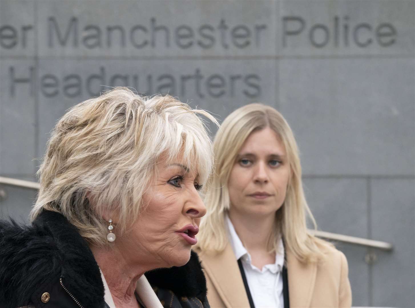 Former detective Maggie Oliver (left) and lawyer Kate Ellis outside GMP’s HQ, after the force paid substantial damages and apologised in 2020 for failing to stop the abuse of three girls groomed in Rochdale (Danny Lawson/PA)