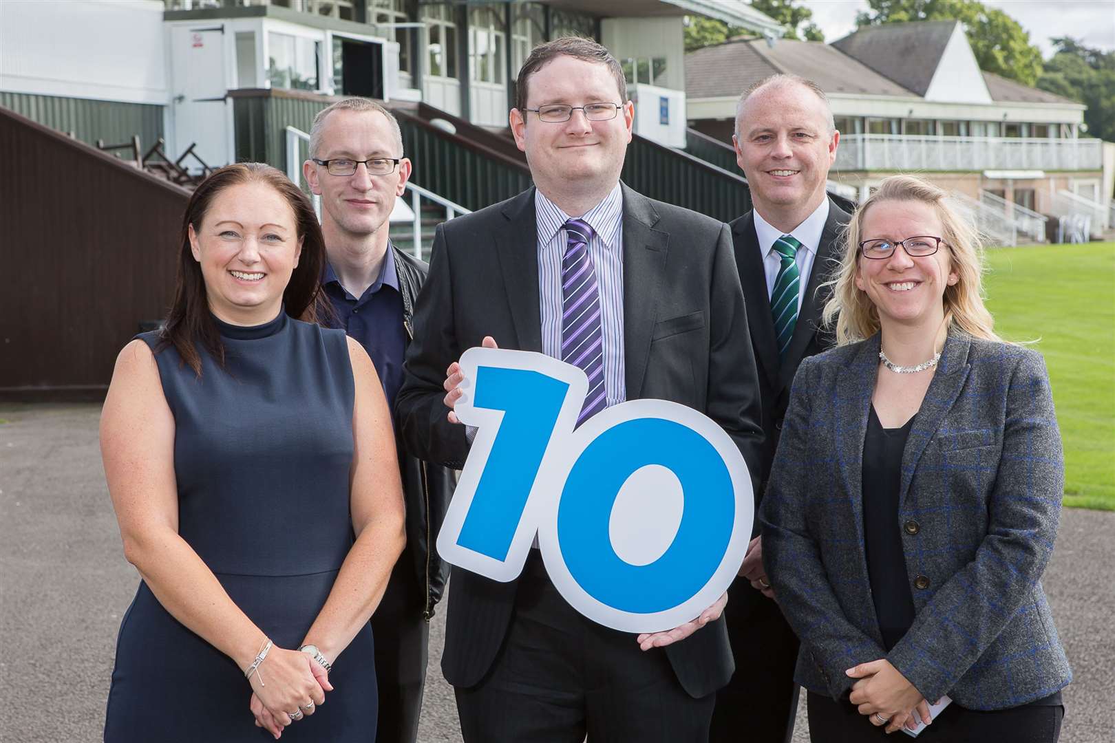 Scott MacDonald (centre) is joined by Inverness colleagues Lynne Walker, Graeme Watson, Scott Newman and Laura Carter as he marks his tenth anniversary with Johnston Carmichael.