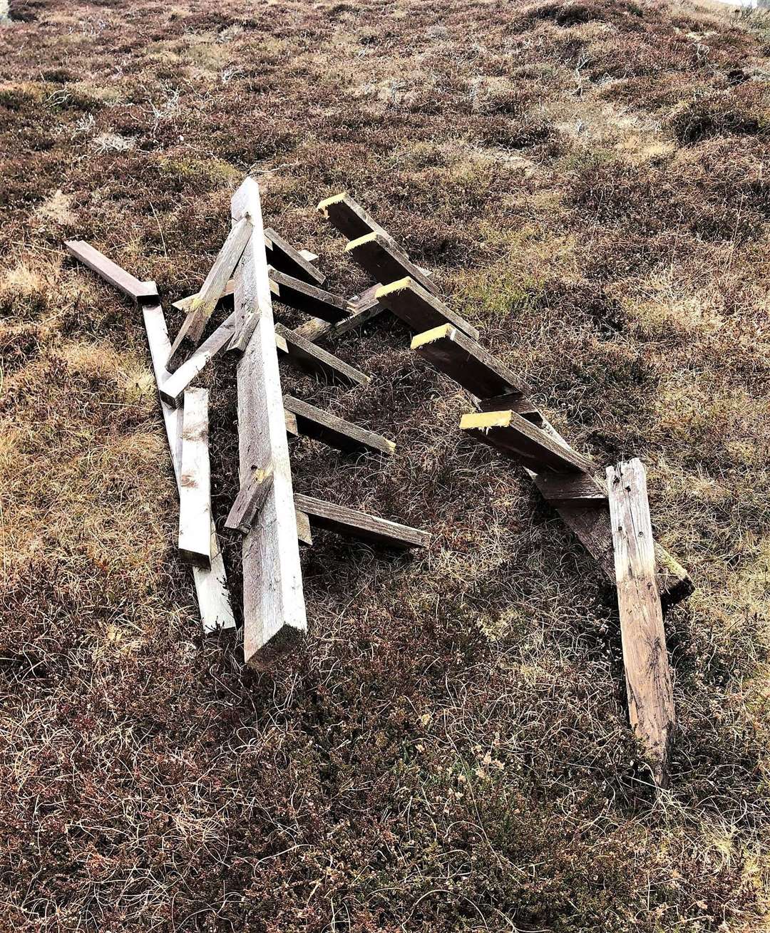 All the steps in this stile appear to be sawn through to make it unusable and beyond repair.