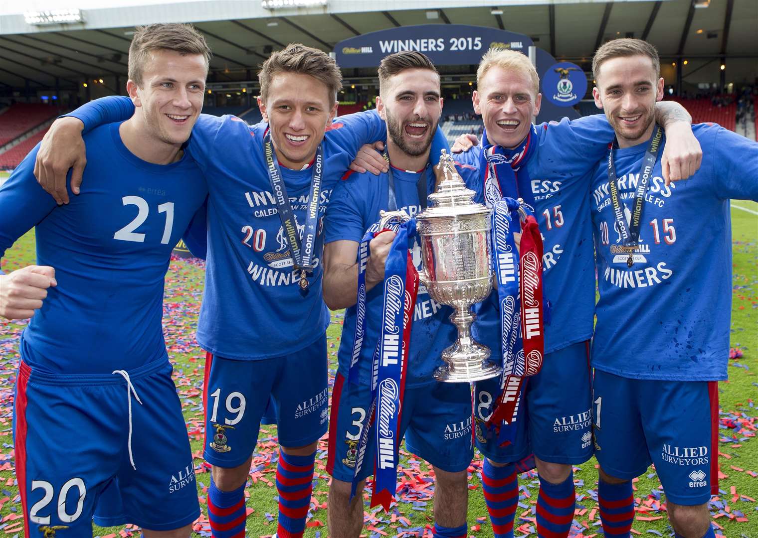 Liam Polworth, Danny Williams, Graeme Shinnie, Carl Tremarco and Nick Ross with the trophy. Picture: Ken Macpherson