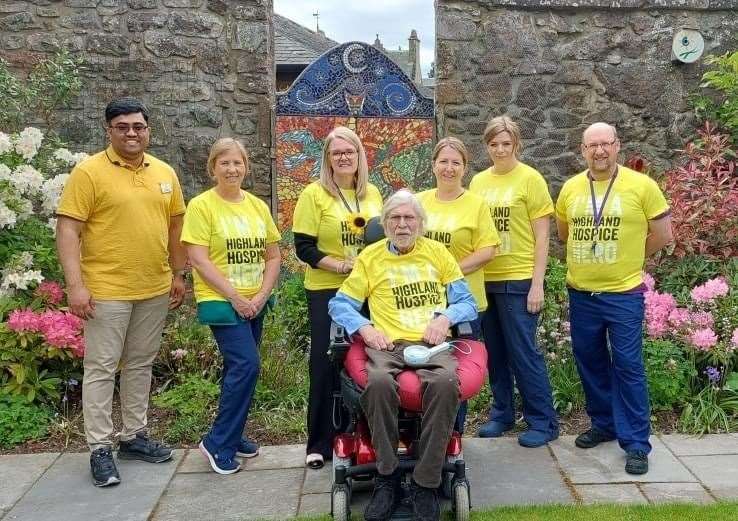 Highland Hospice caregivers with patient Ian.