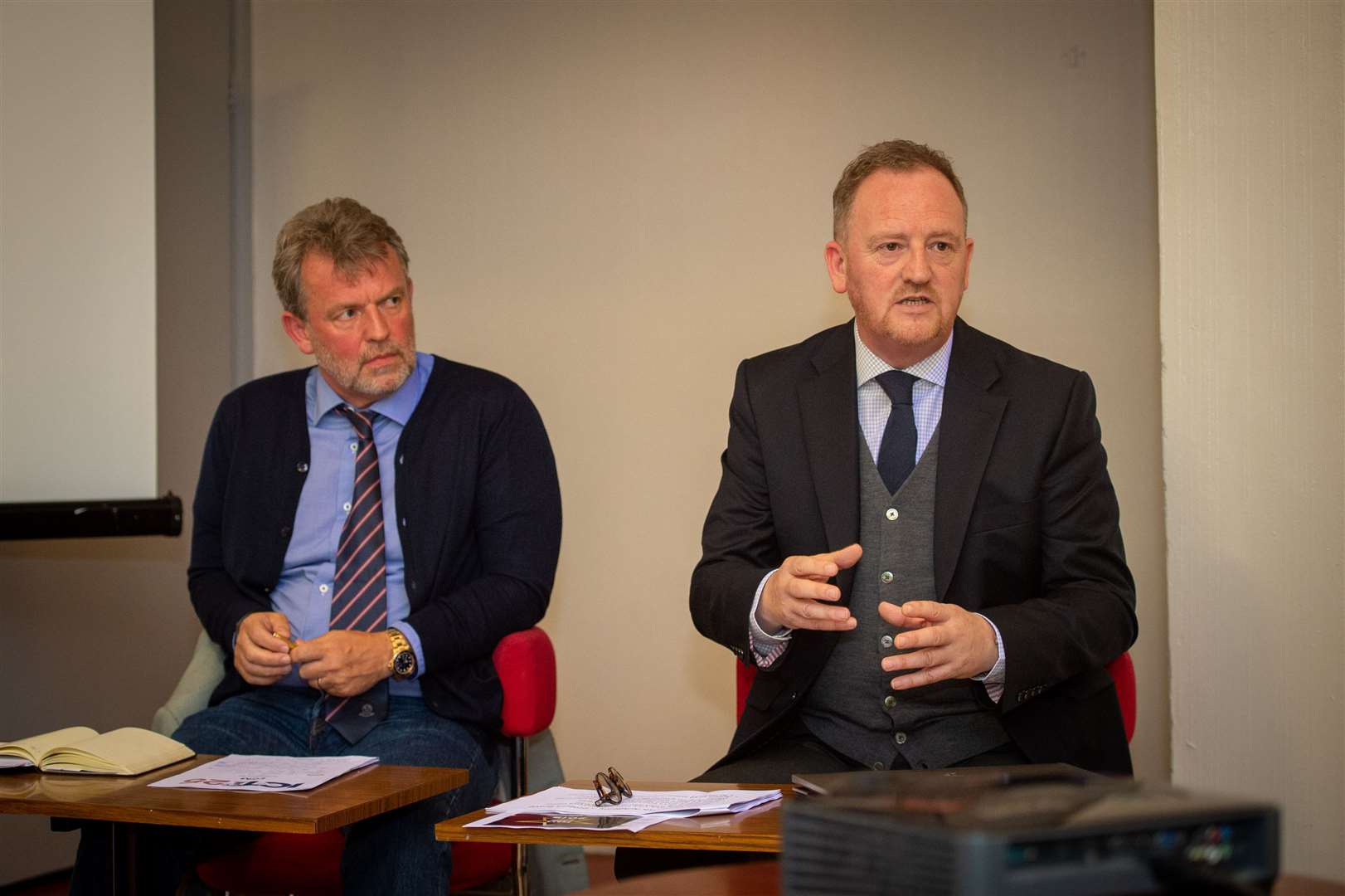 Chairman Ross Morrison and chief executive officer Scot Gardiner speaking at a public meeting in October.