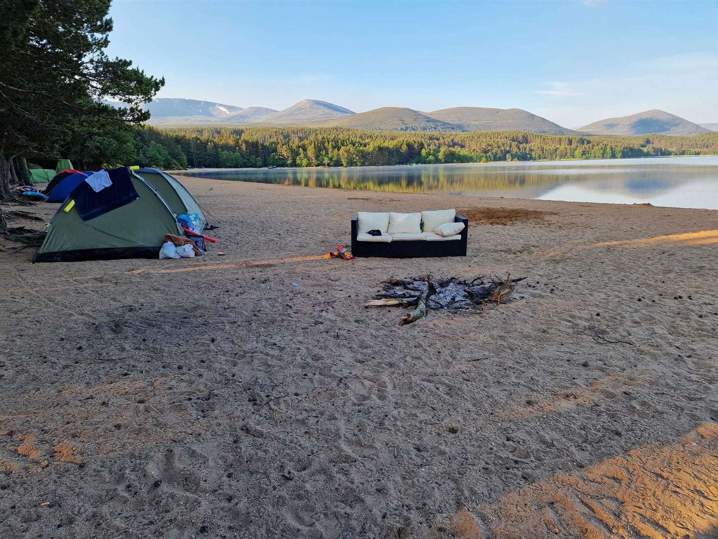 Are you sitting uncomfortably? Some observers are, at the amount of fires being lit on Loch Morlich beach. Picture: Julie N Duncan