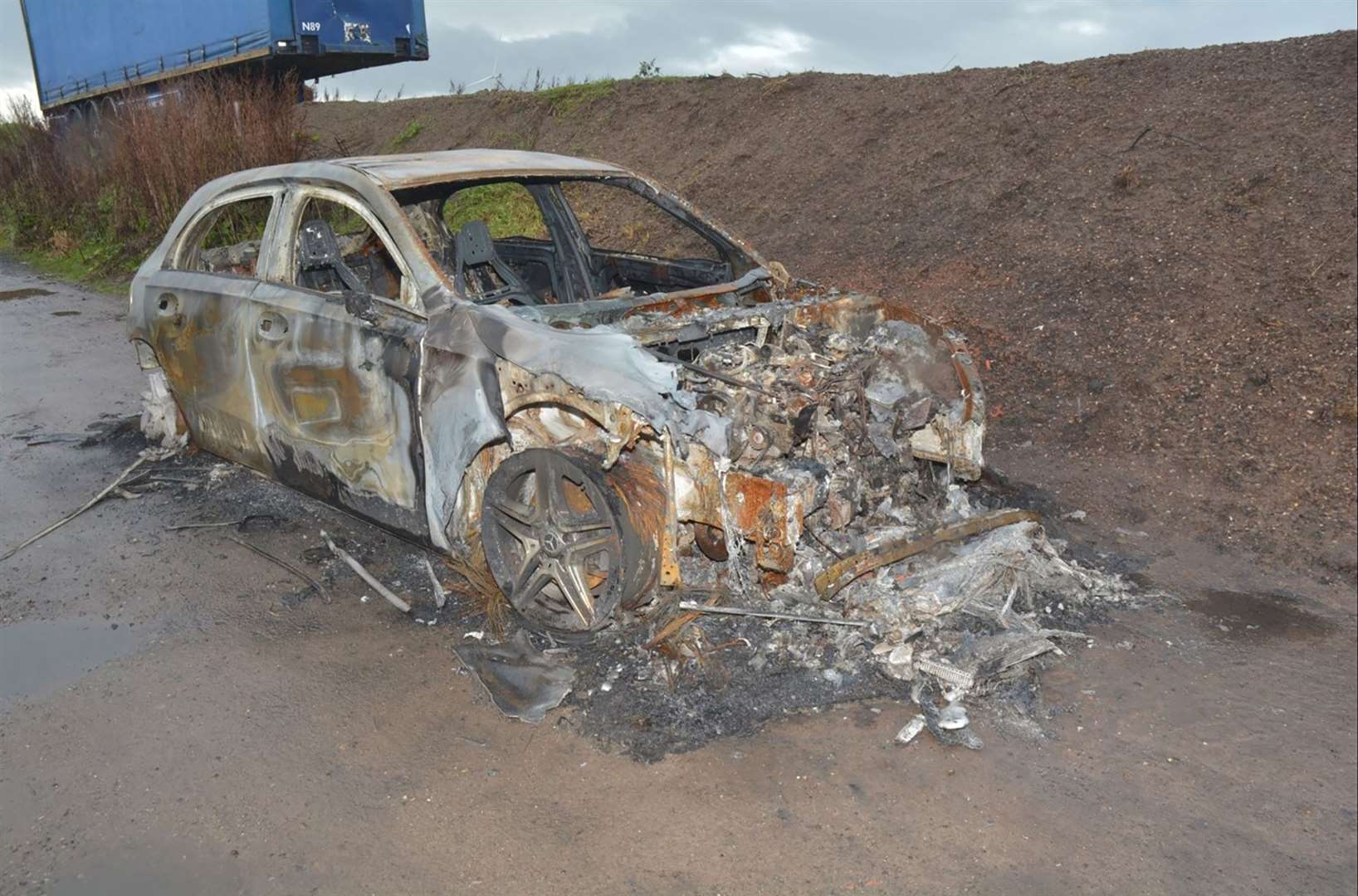 The stolen Mercedes used in the shooting of Elle Edwards after it was burned out in Frodsham, Cheshire (Merseyside Police/PA)