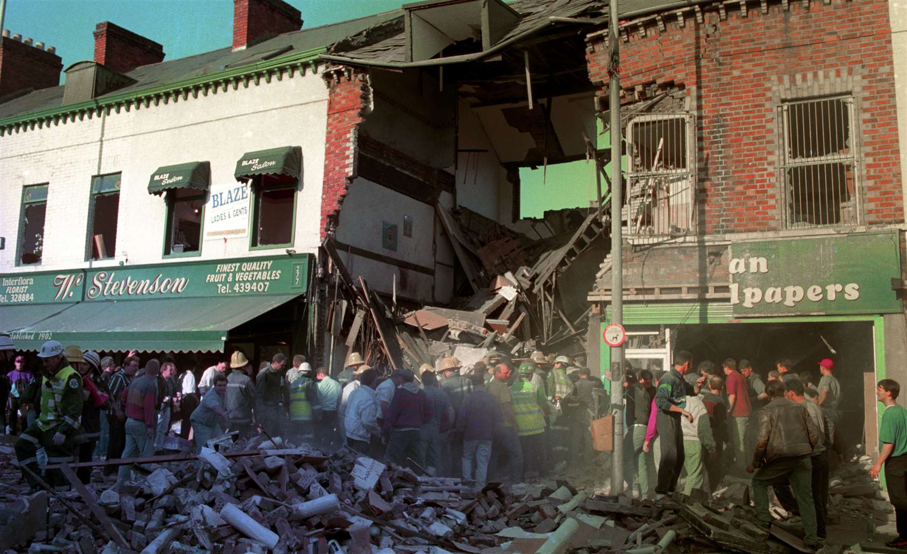 The scene following the Shankill Road bombing in Belfast, Northern Ireland, in 1993 (PA)