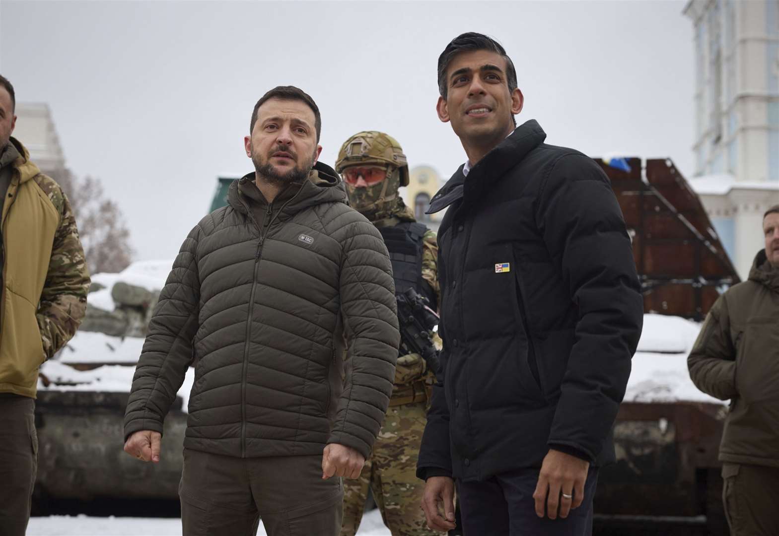 Rishi Sunak with Ukraine President Volodymyr Zelensky as they look at destroyed Russian military vehicles in Kyiv (Ukrainian Presidential Press Office/PA)