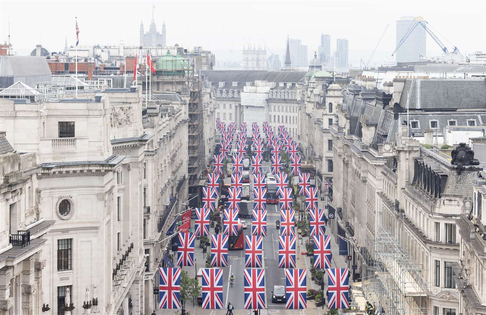 Union flags fly above Regent Street in London to celebrate the coronation (Matt Alexander/PA)