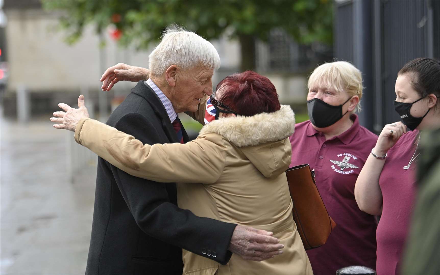 Dennis Hutchings is greeted by supporters at an earlier hearing of his trial at Belfast Crown Court (Mark Marlow/PA)