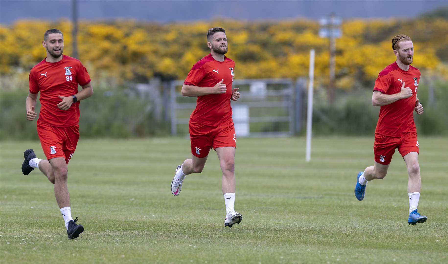 Picture - Ken Macpherson, Inverness. See story. Inverness CT’s 1st day back at training at Fort George for the new season ahead. Having fun are (l to r) Robbie Deas, Danny Devine and David Carson.