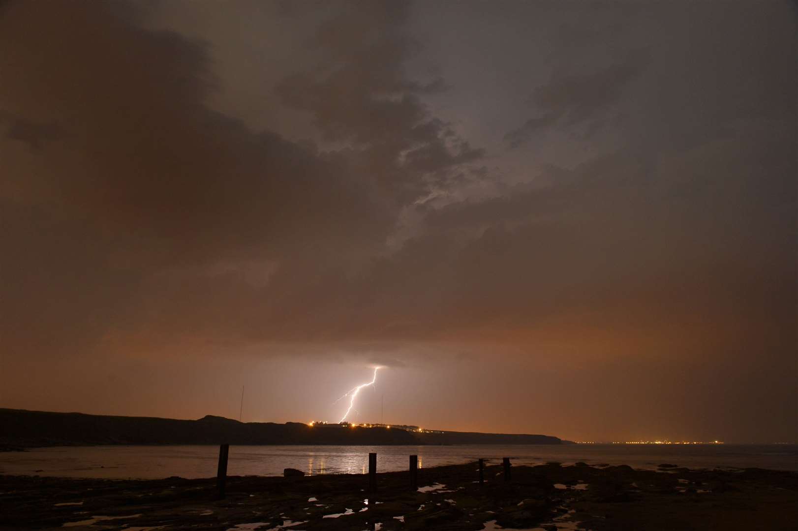 Amber-warning areas could see buildings damaged by lightning (Owen Humphreys/PA)