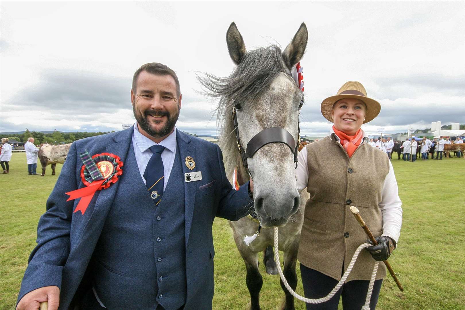 Black Isle Show president Jock McKenzie with this year's champion of champions, McGregor of Millfeld, a Highland Pony shown by Sara-Jane Forbes. Photo: Marc Hindley/Black Isle Show