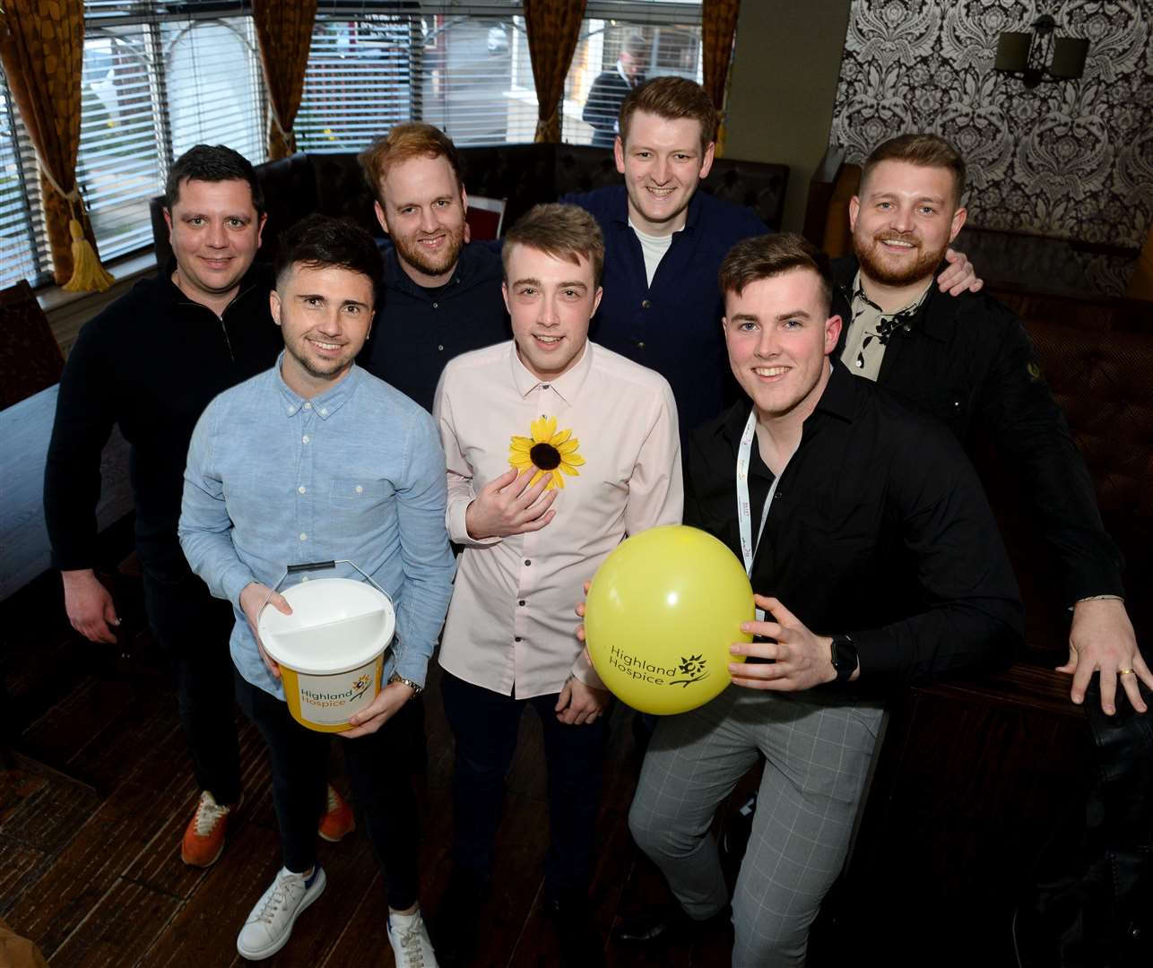 Adam Crichton(right) with fellow members of Highland Hospice FC.