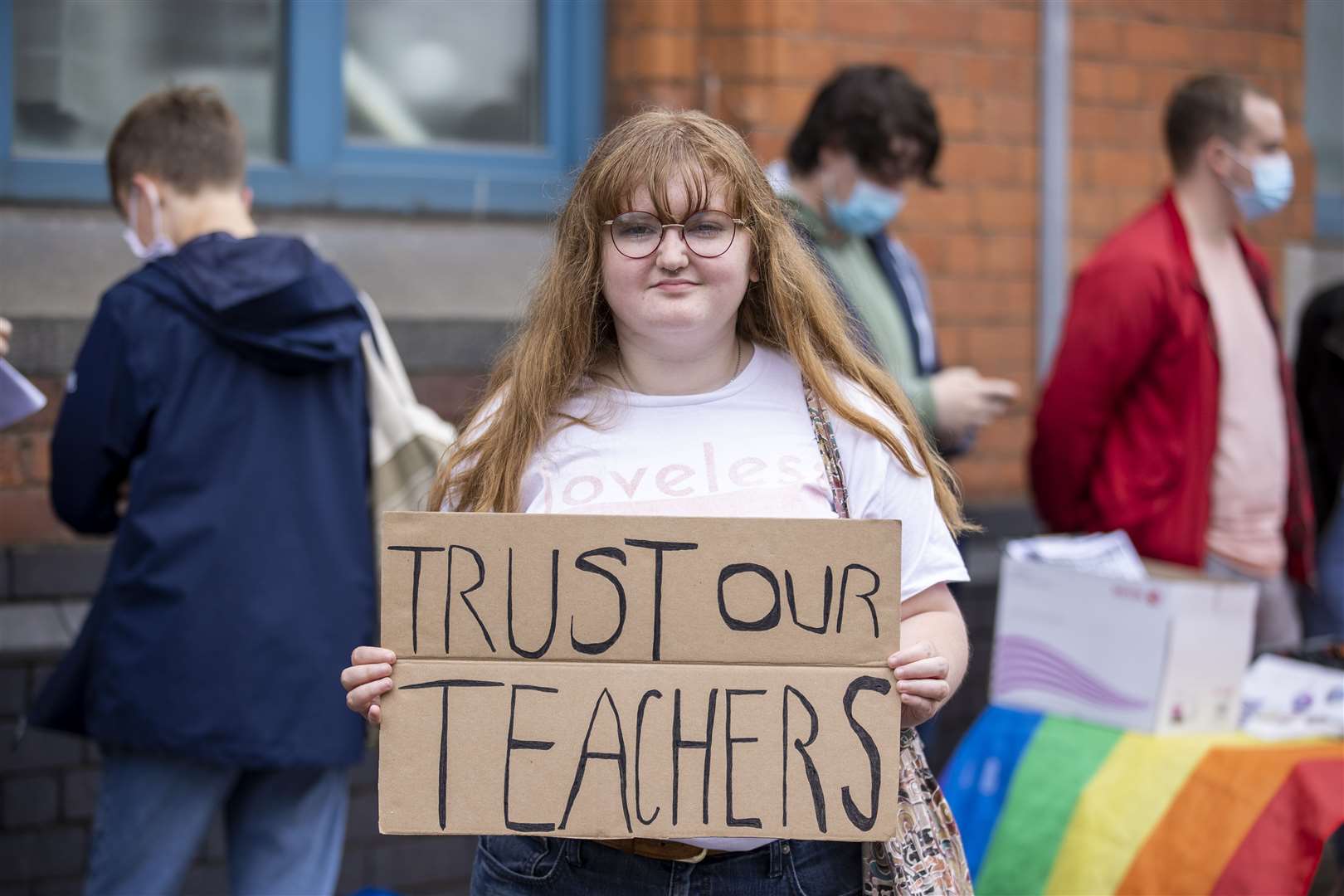 Zara Meadows, an AS-level student from Belfast Royal Academy, poses during an August protest at the Northern Ireland Education Authority in Belfast, over Northern Ireland Minister of Education Peter Weir’s decision on A-level results (Liam McBurney/PA)