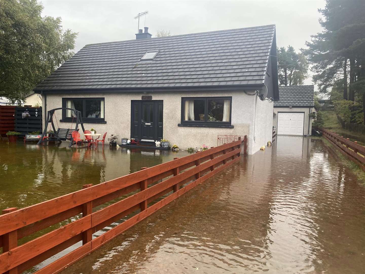 The waters are rising all the time in Aviemore, where for hours the Met Office has been highlighting its weather warnings. Picture Linda Fraser