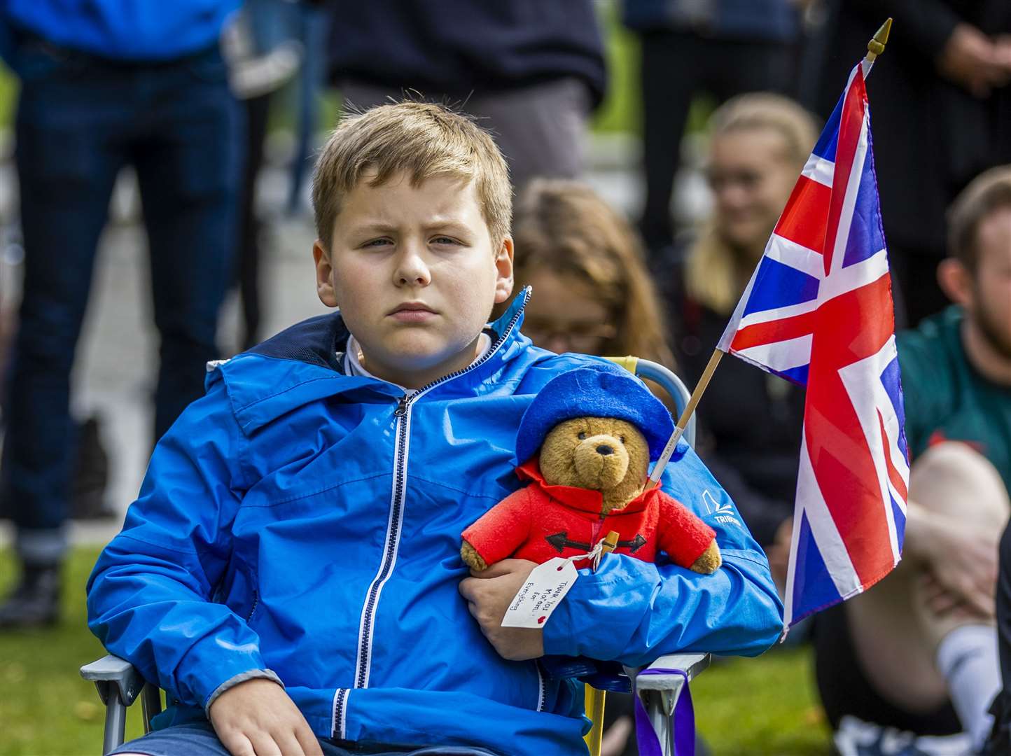 Tom Murray (9) with his Paddington Bear that has a special message thanking the Queen (Liam McBurney/PA)