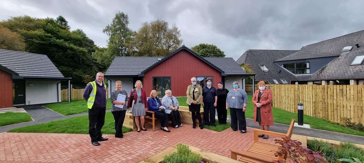 Representatives of Compass Building and Construction Services, Highland Council, NHS Highland, Fort Augustus and Glenmoriston Community Company and Telford Centre Care Home celebrate completion of the project.
