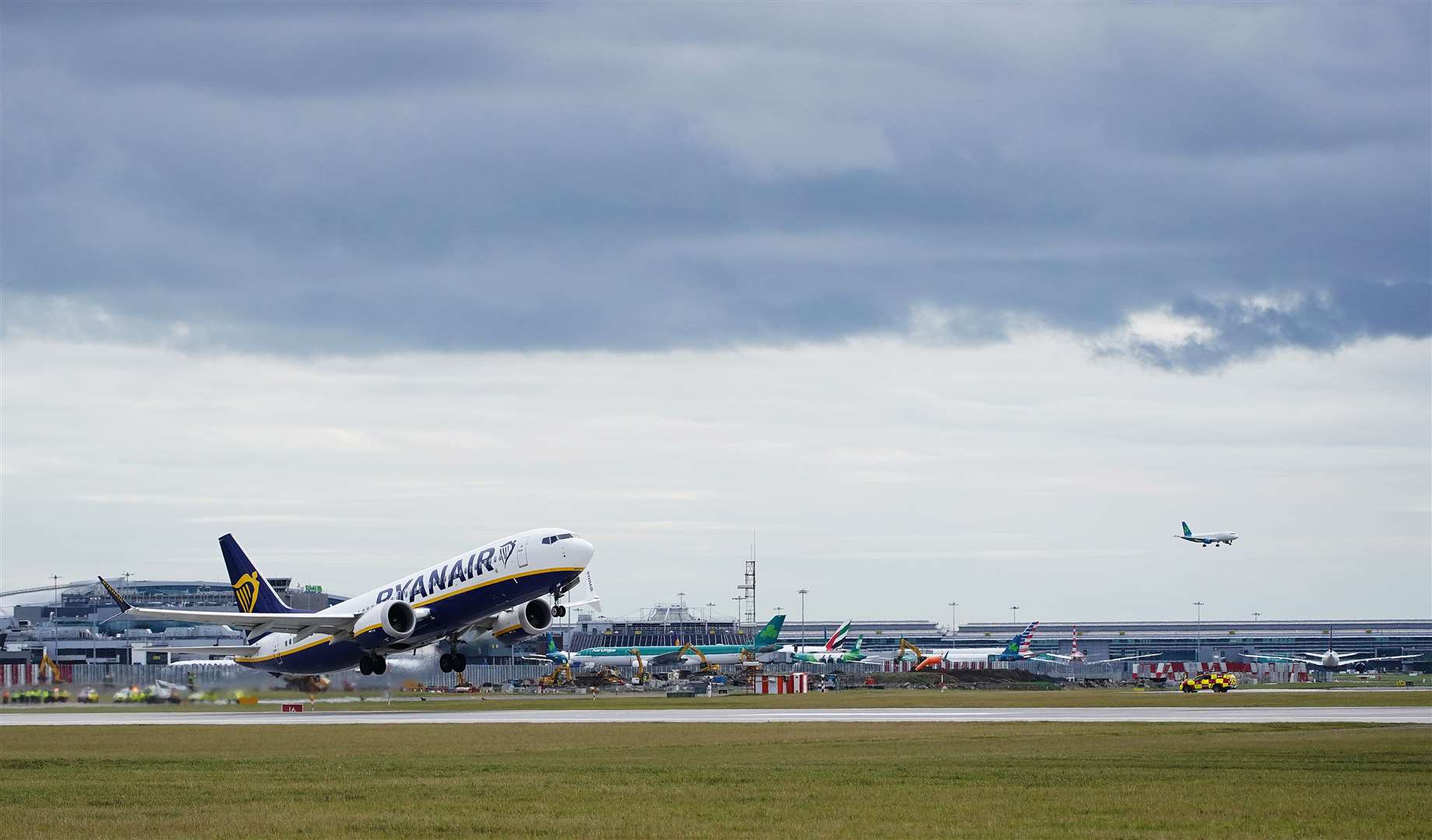 A Ryanair flighttakes off from Dublin Airport (Brian Lawless/PA)