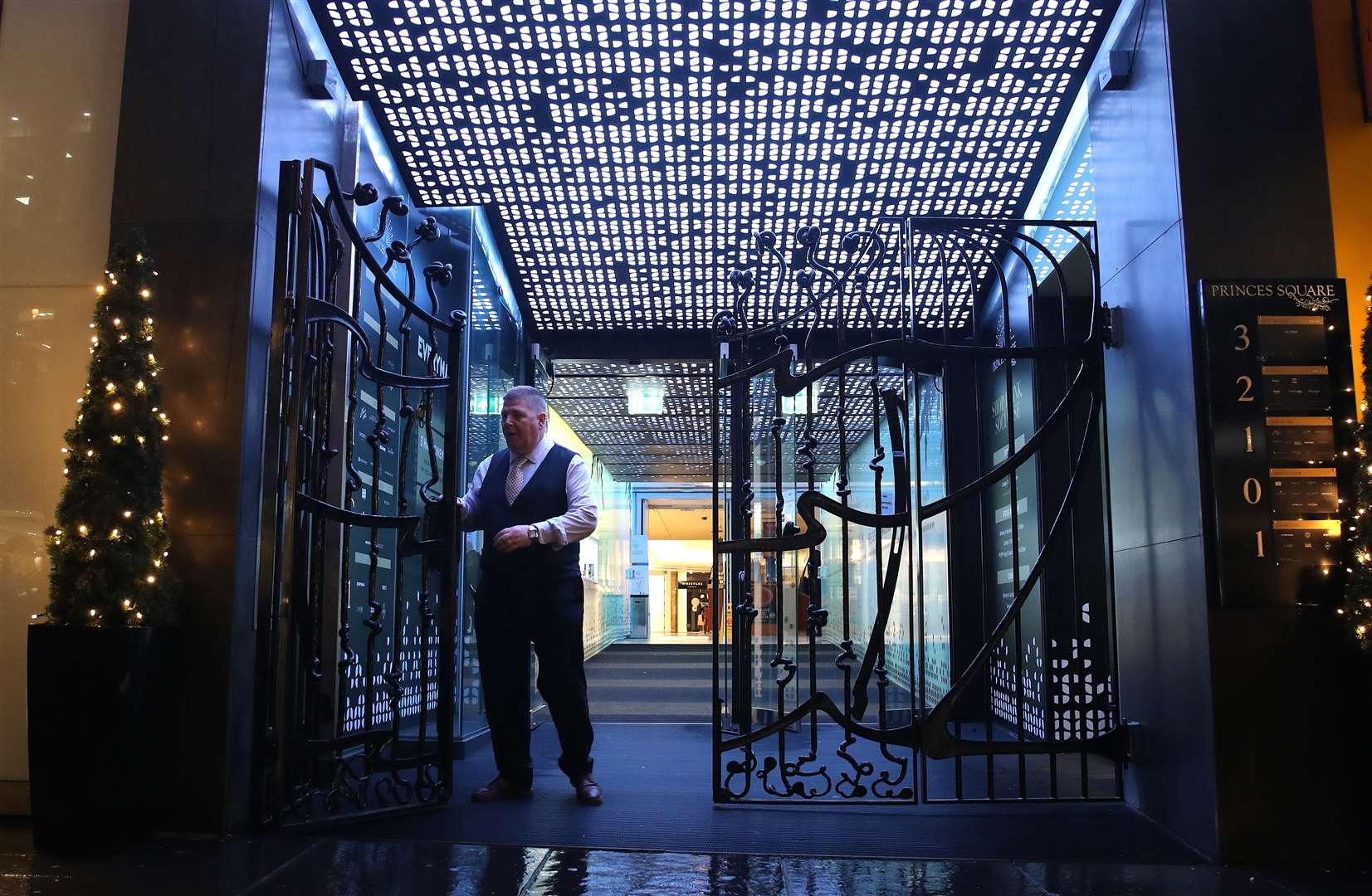 The gates to Princess Square Shopping Centre in Glasgow are closed as new restrictions come into force (Andrew Milligan/PA)