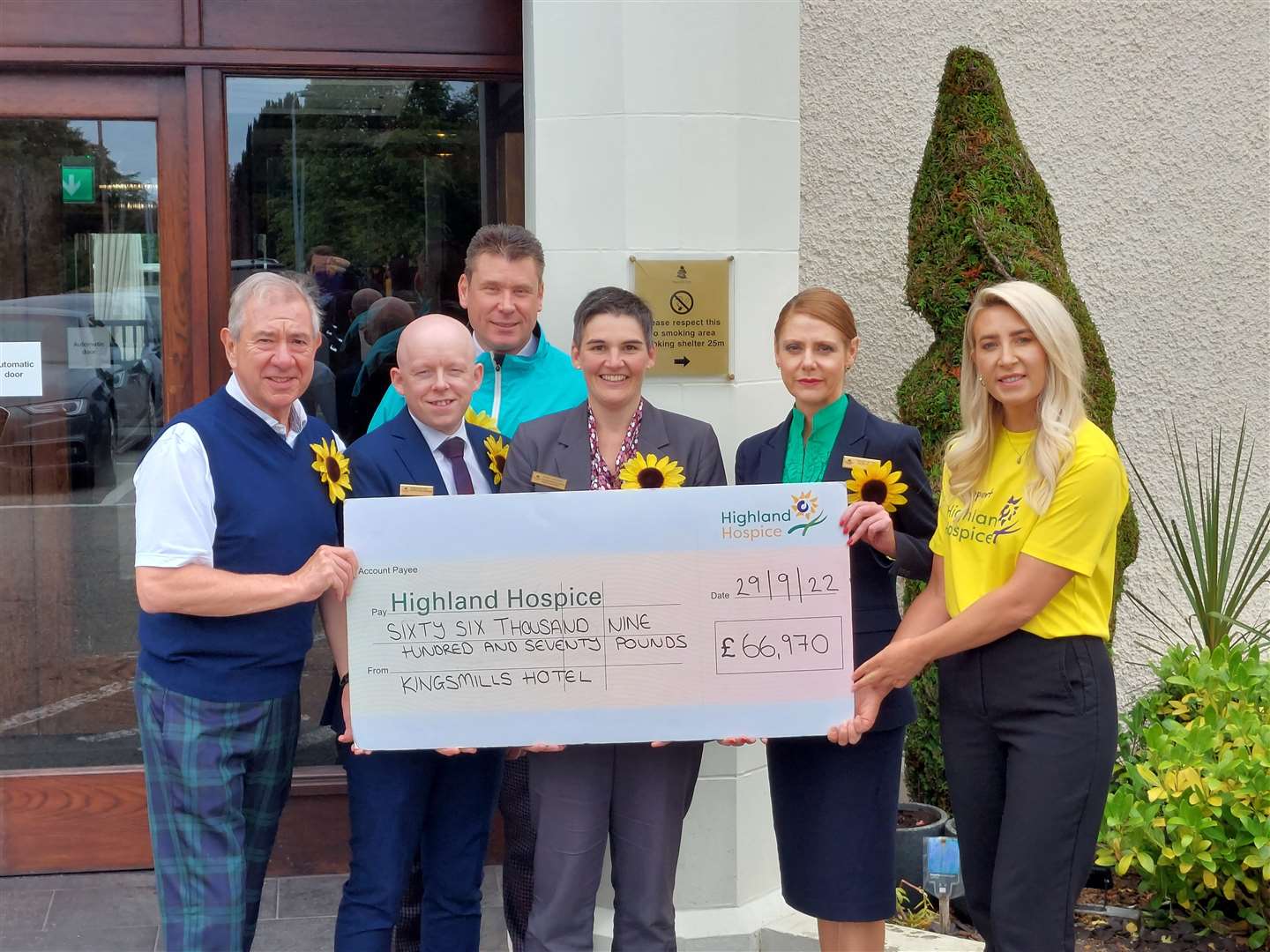 Tony Story (left) with representatives at the cheque presentation to Highland Hospice at the Kingsmills Hotel in Inverness.