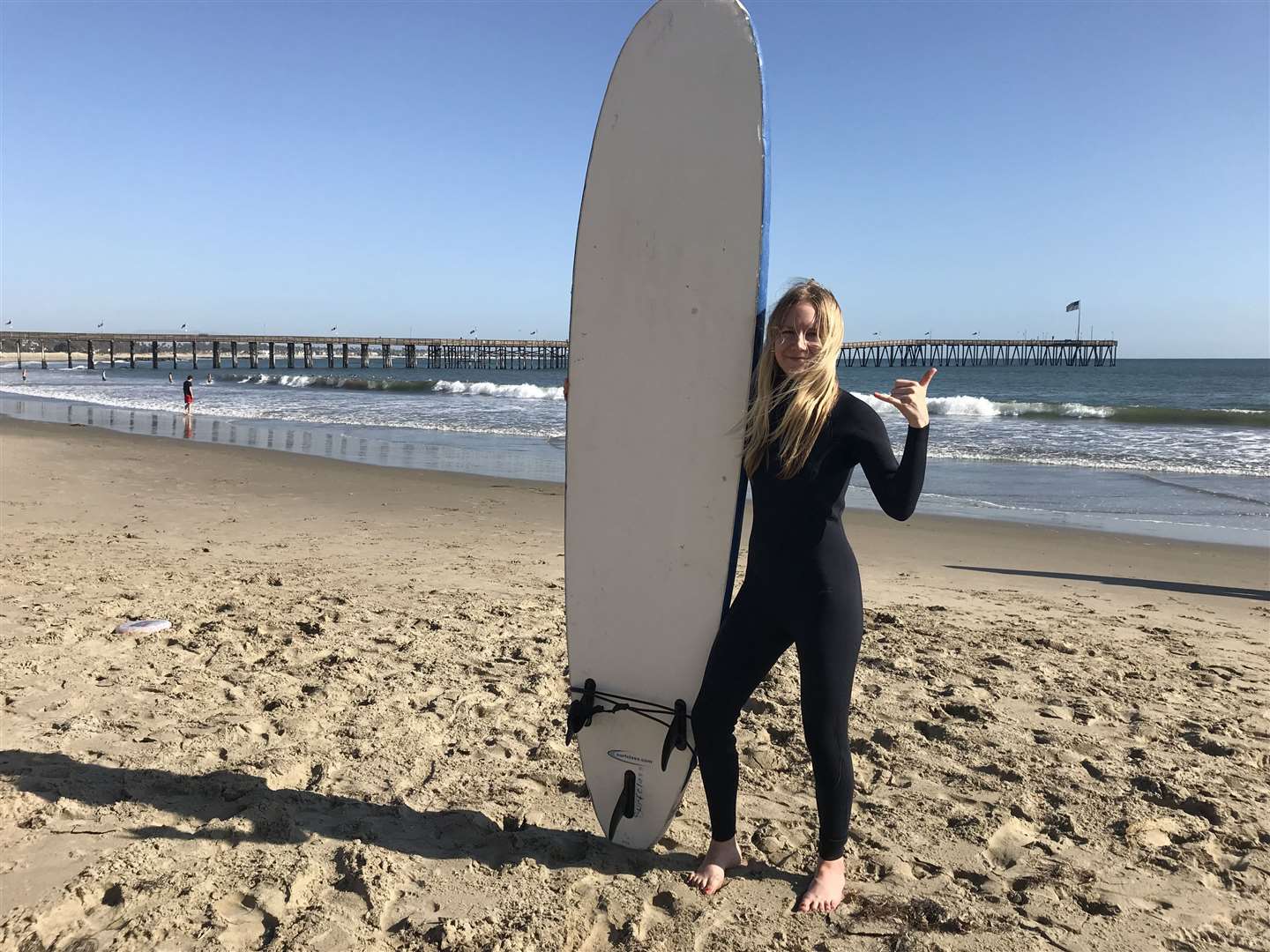 Journalist Liz Connor taking a surfing lesson on Ventura Beach. Picture: PA Photo/Liz Connor